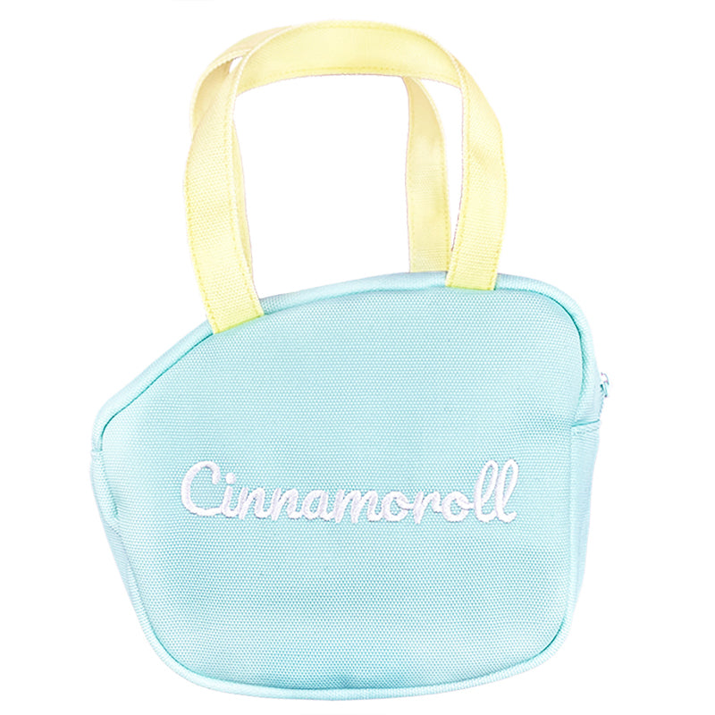 Cinnamoroll handbag displayed with kawaii desk accessories and plush toys.