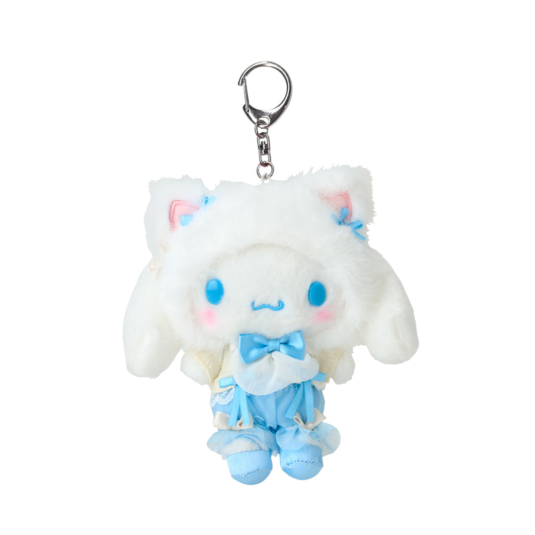 Front view of the sanrio cinnamoroll plush in ballet outfit sitting on a pastel desk
