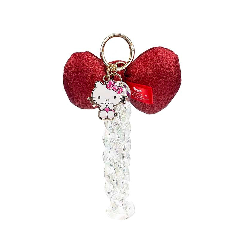 Close-up of Hello Kitty metallic bag charm showcasing the bow detail.