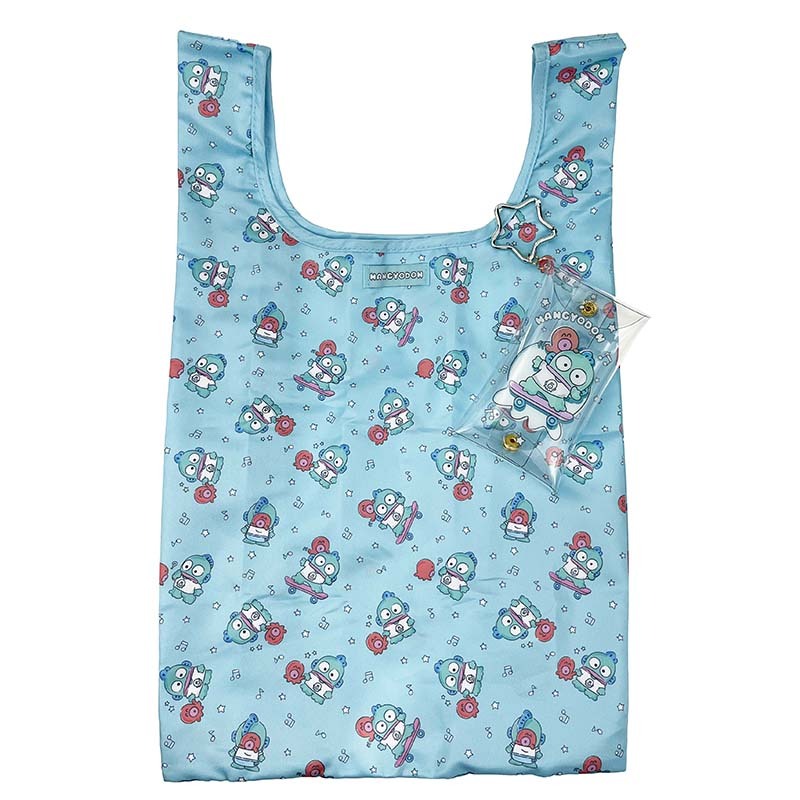Reusable tote bag shown with snap closure and carabiner attachment, folded for storage