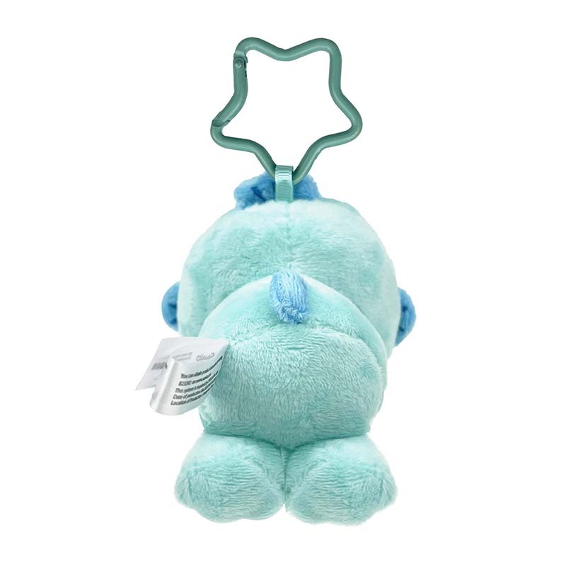 Hangyodon plush measuring tape displayed on a crafting table with fabric scraps.