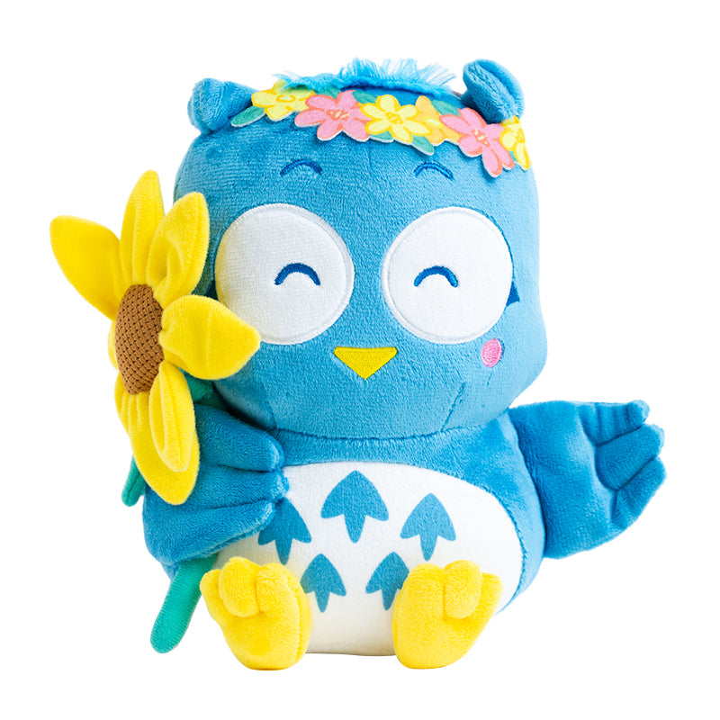 PataPataPeppy flower plush doll smiling with sunflower in daylight