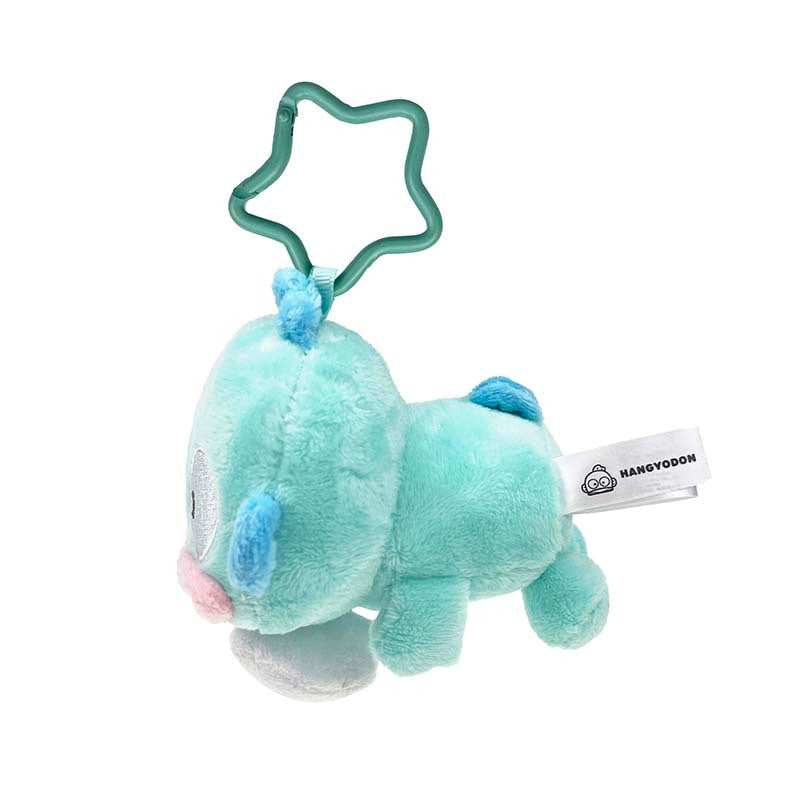 Hangyodon plush charm attached to a keychain with tape retracted.