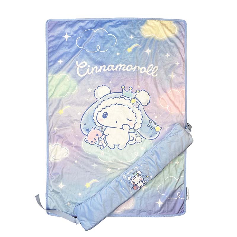 Cinnamoroll reversible blanket throw folded neatly beside travel pillow