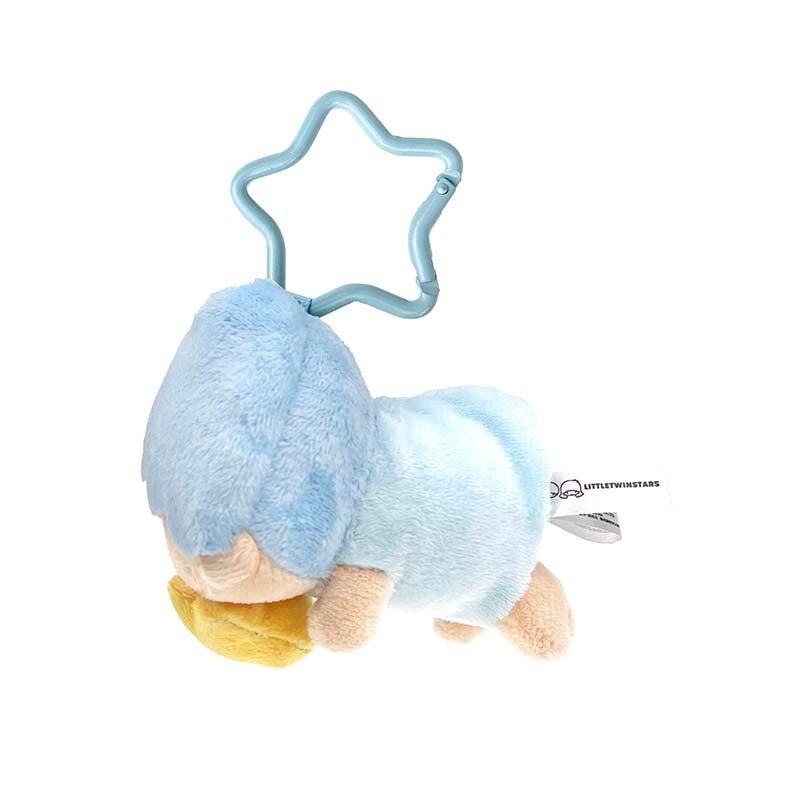 Kiki plush measuring tape in use, measuring a piece of cute stationery paper