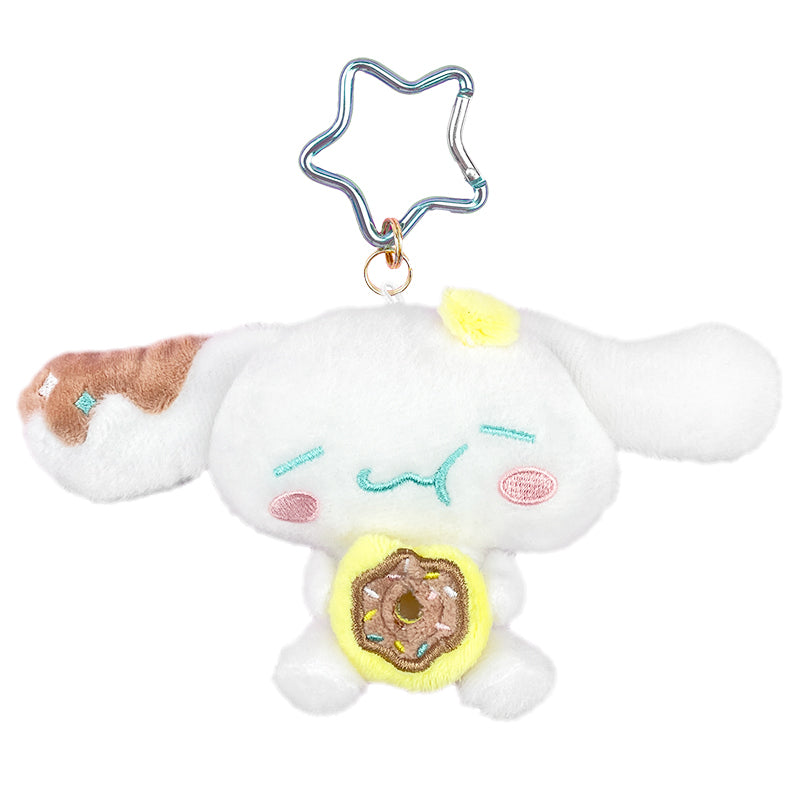 Front view of Sanrio cinnamoroll plush keychain showing embroidered details and donut accents.