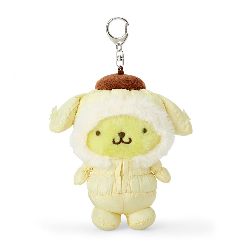 Pompompurin keychain hanging from a backpack in natural light
