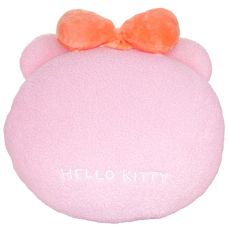 Hello Kitty plush pillow displayed on a desk chair in a pastel-themed room.