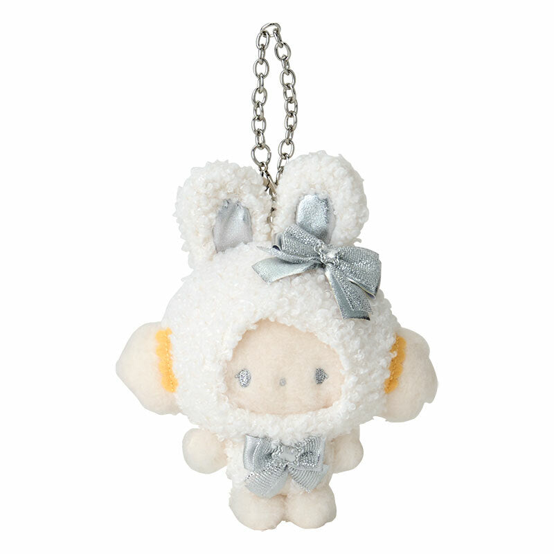 Close-up of the snow bunny plush bag charm showcasing its metallic eyes and bunny ears.