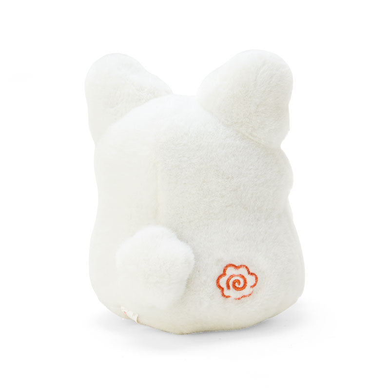 A close-up of the Hanamaruobake plush toys embroidered details and hanamaru design.