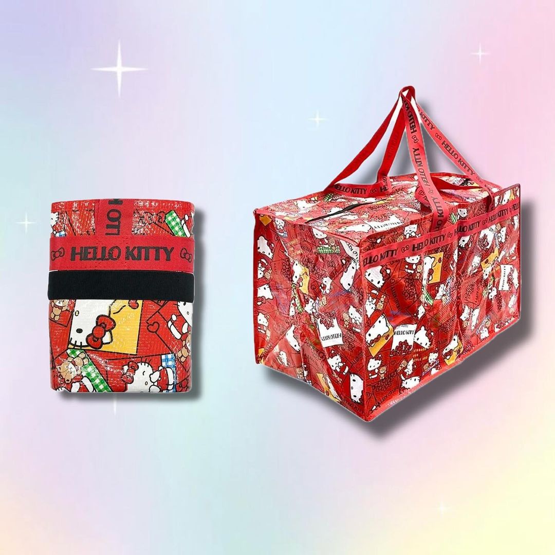 Side view of Hello Kitty waterproof storage bag with foldable design, placed in garden.