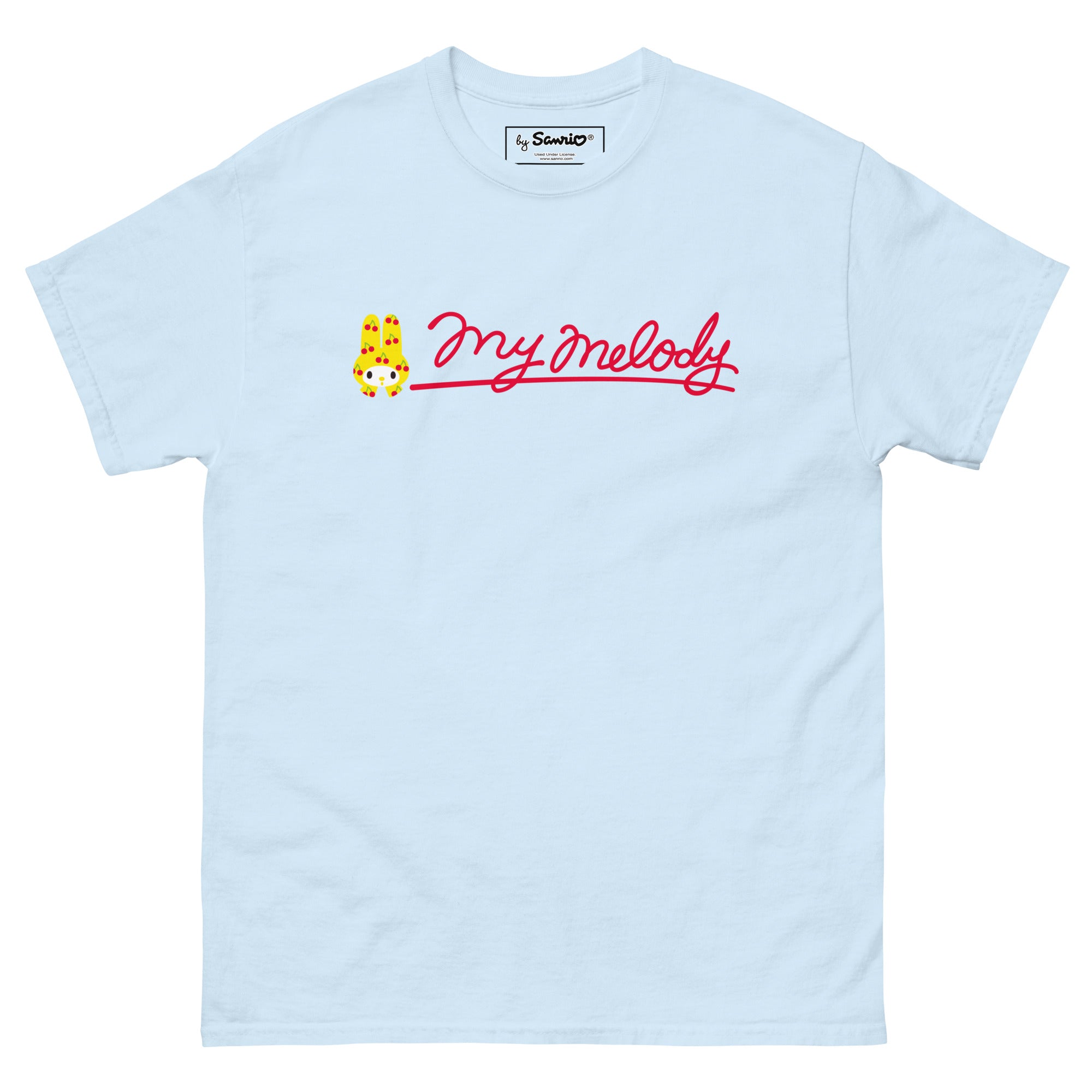 Front view of the t-shirt styled with loose denim in an Atlanta cityscape