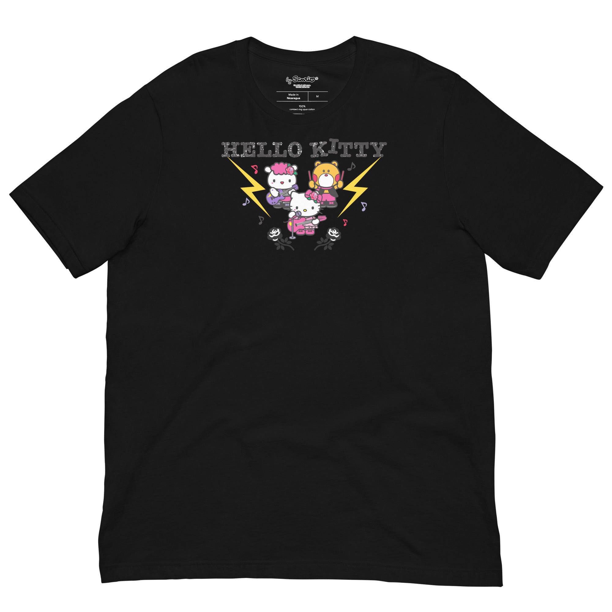 Model wearing Hello Kitty birthday t-shirt at a rock show, radiating fun.