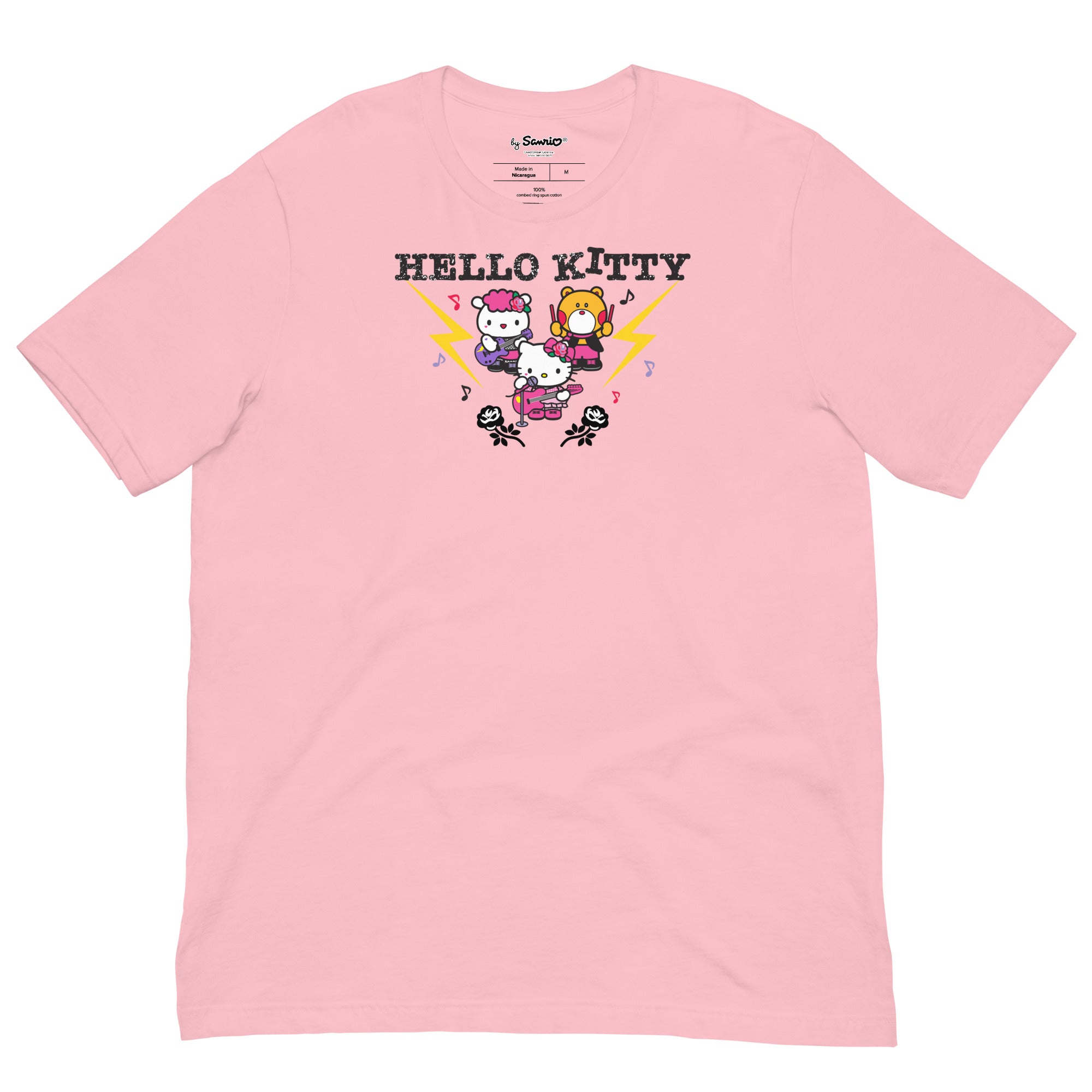 Model wearing Hello Kitty birthday t-shirt at a rock show, radiating fun.