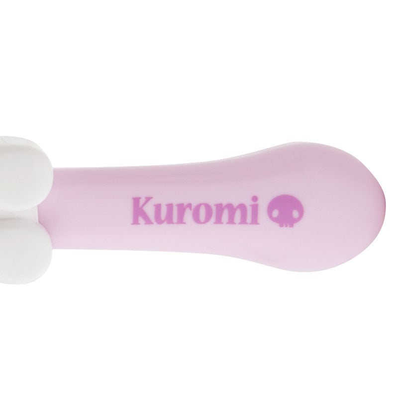 Portable hair brush tucked into a backpack for on-the-go styling