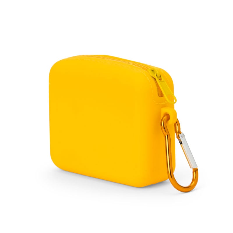 Mini pouch held in hand with dog treats inside, showcasing practical use