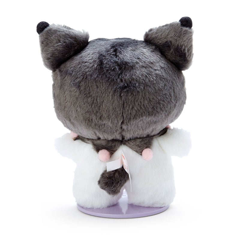 Close-up of Mocha Sanrio Plush with magnetic feet connected to its base.