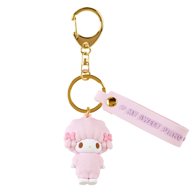 Front view of My Sweet Piano character keychain with molded plush and gold clasp