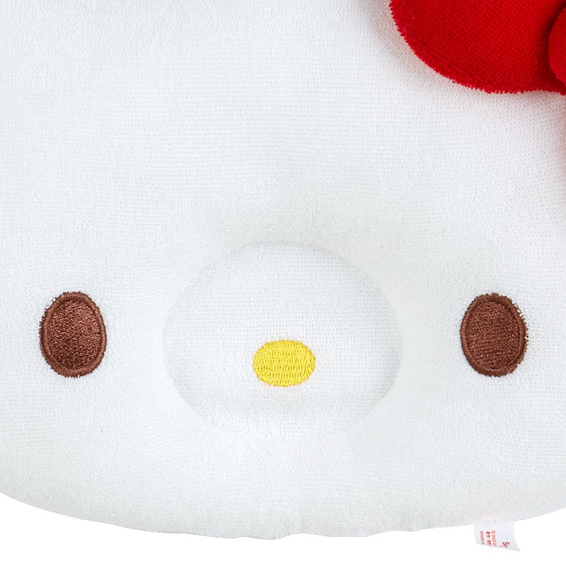 Close-up of the soft poly material and cute design of the baby pillow