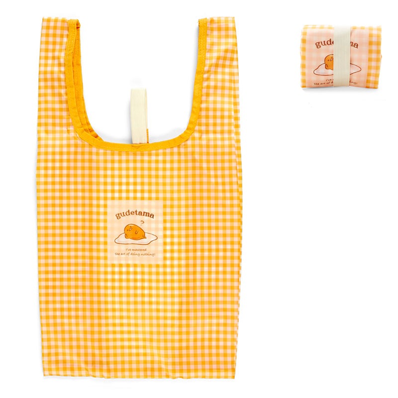 Gudetama Gingham reusable tote bag with groceries inside, perfect for shopping trips.