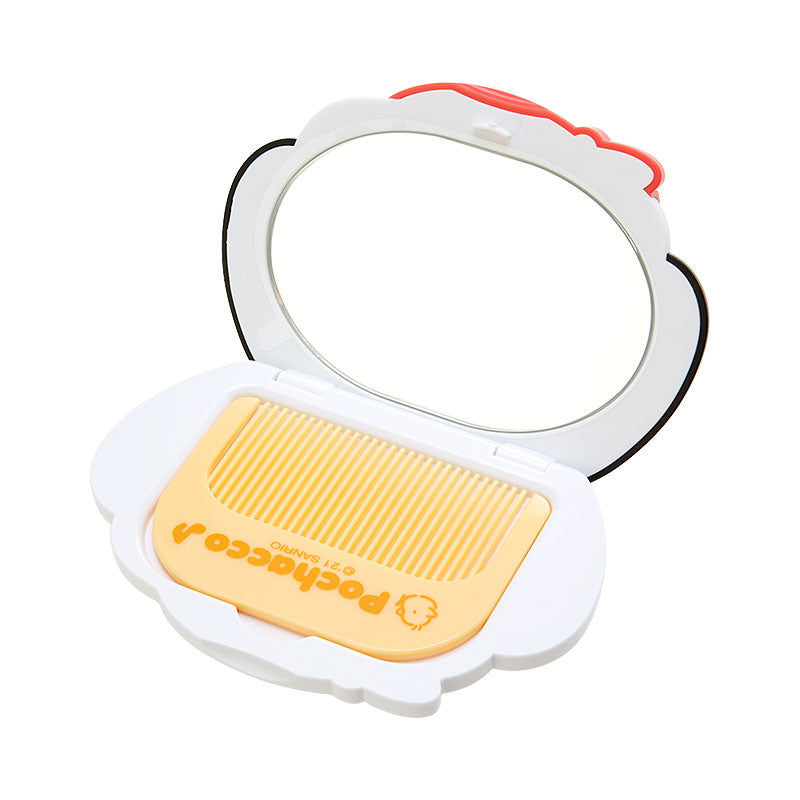 Pochacco 2-piece travel mirror and comb set in use