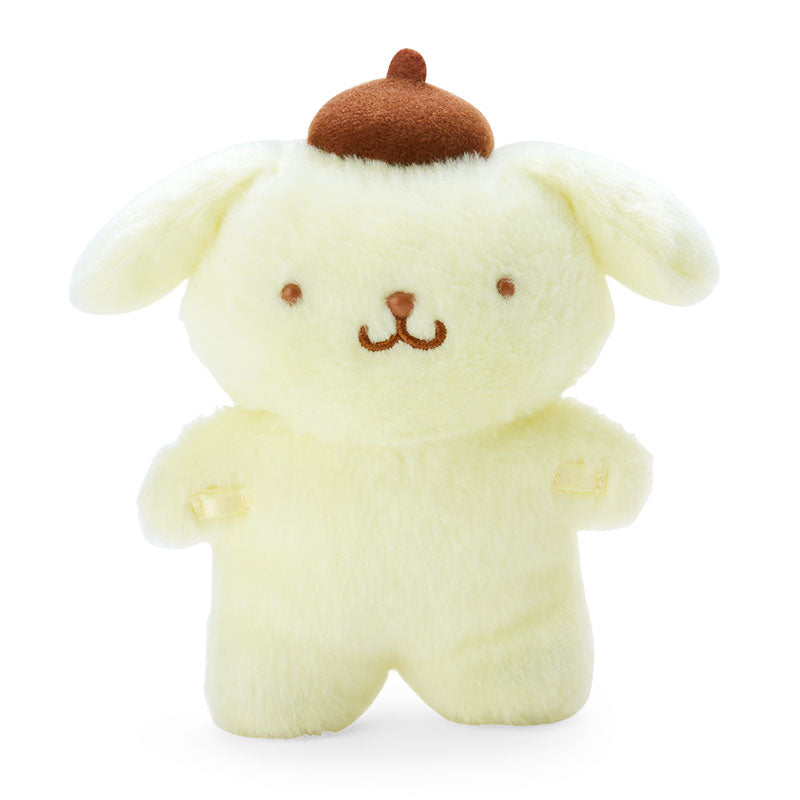 Pompompurin plush toy standing on a desk with magnetic feet