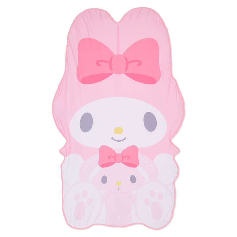 My Melody green plush throw blanket spread on a bed, showcasing its vibrant print.