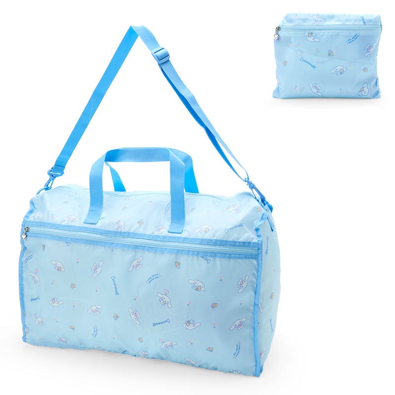 Front view of foldable Cinnamoroll bag on luggage in a NYC airport lounge