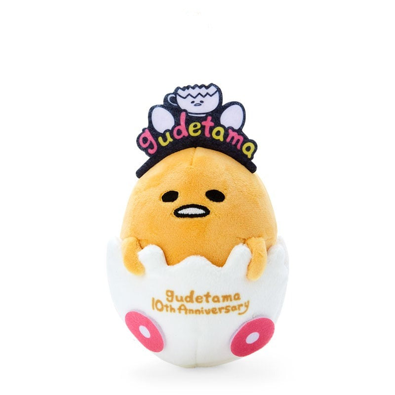 Close-up of Gudetama plush mascot showing clasp and stitching