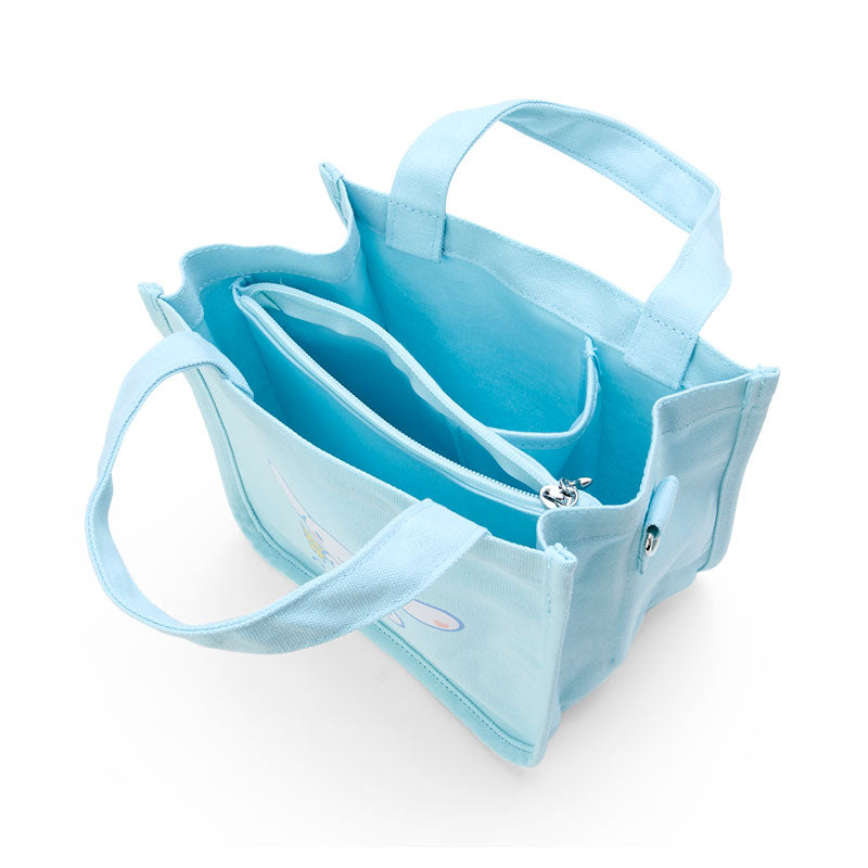 Close-up of the tote bags interior zippered compartment