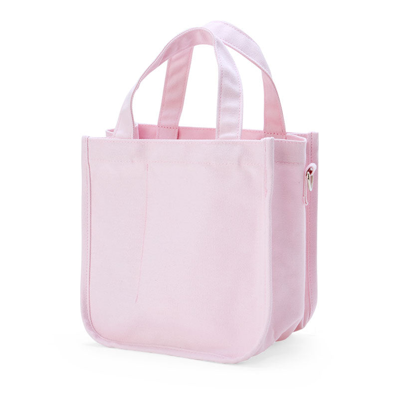 My Melody Cotton Convertible Mini Tote Bag being carried as a mini tote
