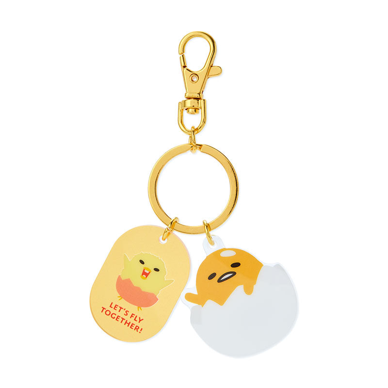 Close-up of Gudetama keychain showing acrylic friendship motif