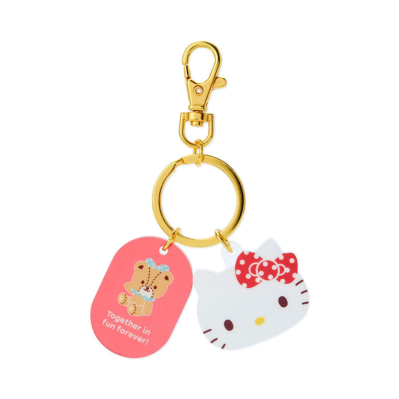 Hello Kitty plush keychain close-up, highlighting its soft plush material and detailed design.