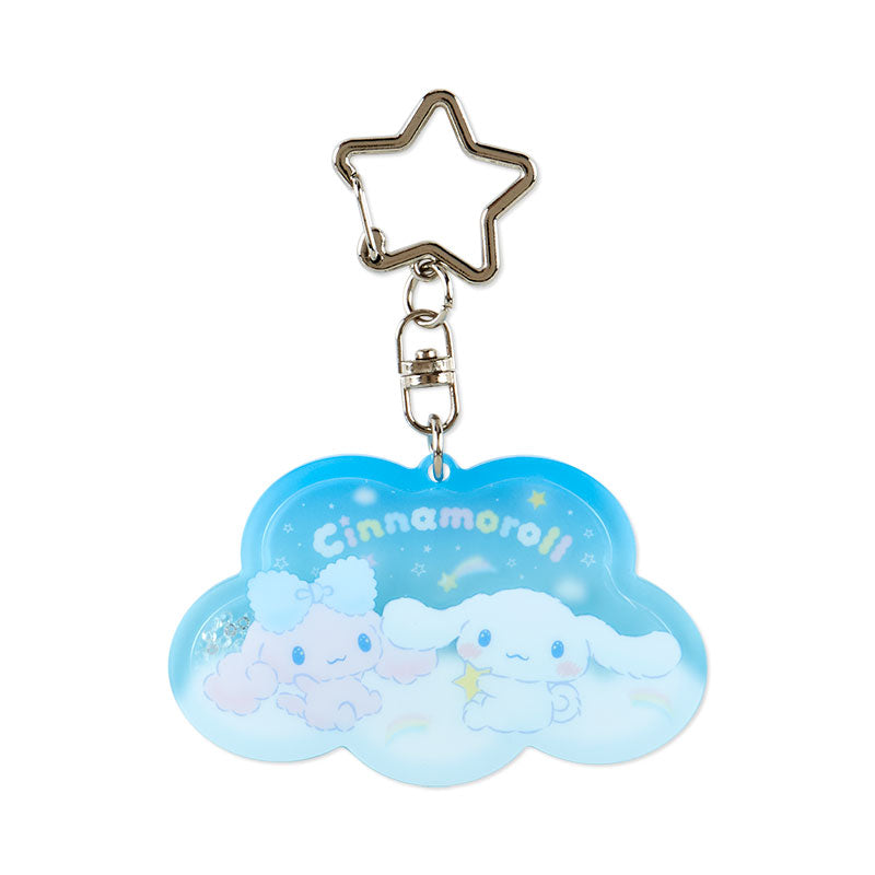 Cinnamoroll acrylic keychain displayed on a backpack with clouds in the background.