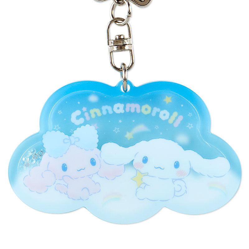 Cinnamoroll plush keychain alongside the acrylic version for a cute comparison.