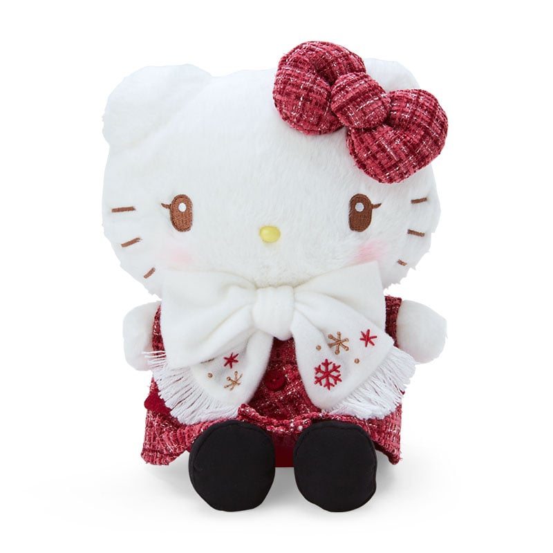Hello Kitty plushie wearing a cozy winter scarf and tweed accents.