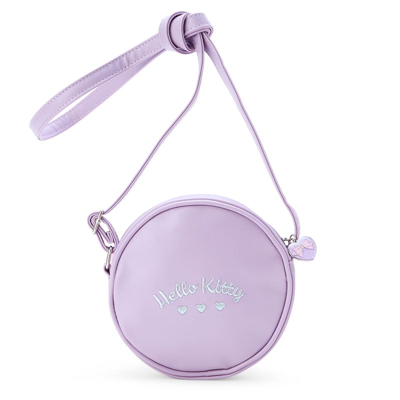 Plush crossbody Hello Kitty bag being carried over the shoulder