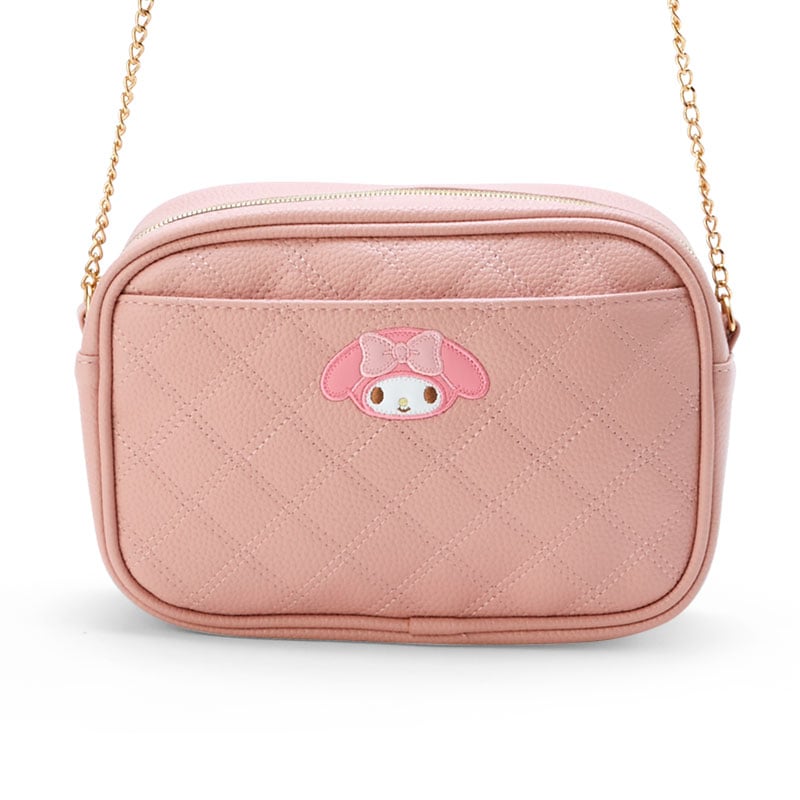 Detailed view of gold hardware and embroidered Sanrio character