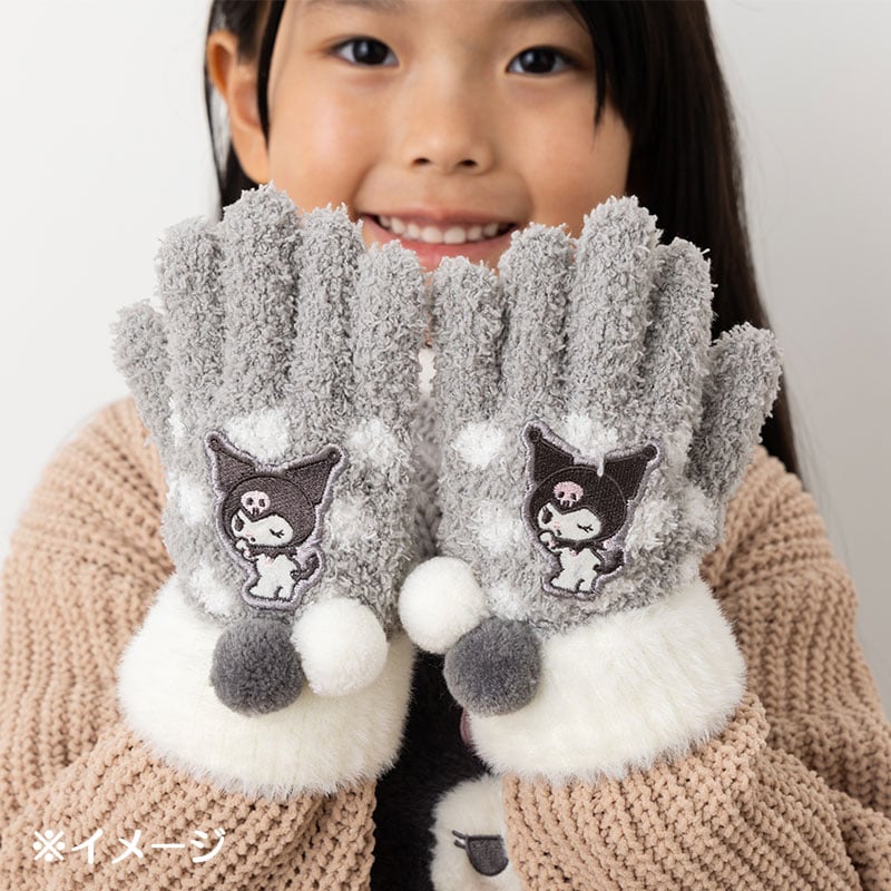 A child wearing Kuromi Kids Gloves while playing in the snow
