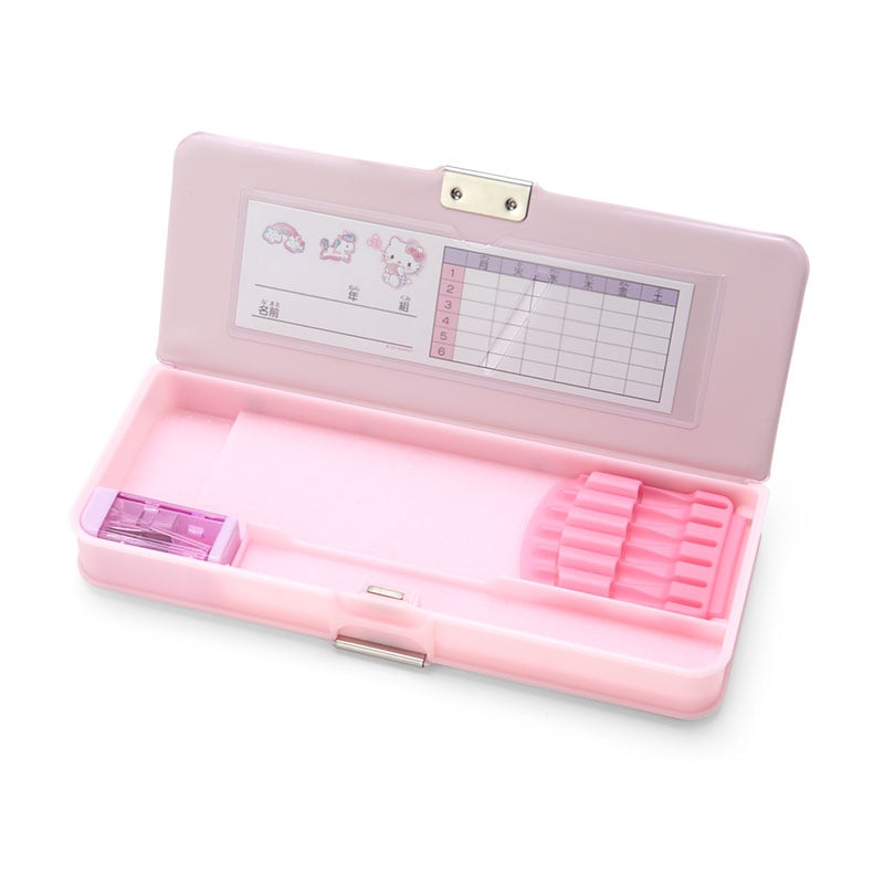 Open Hello Kitty pencil case box displaying compartments and mini sharpener