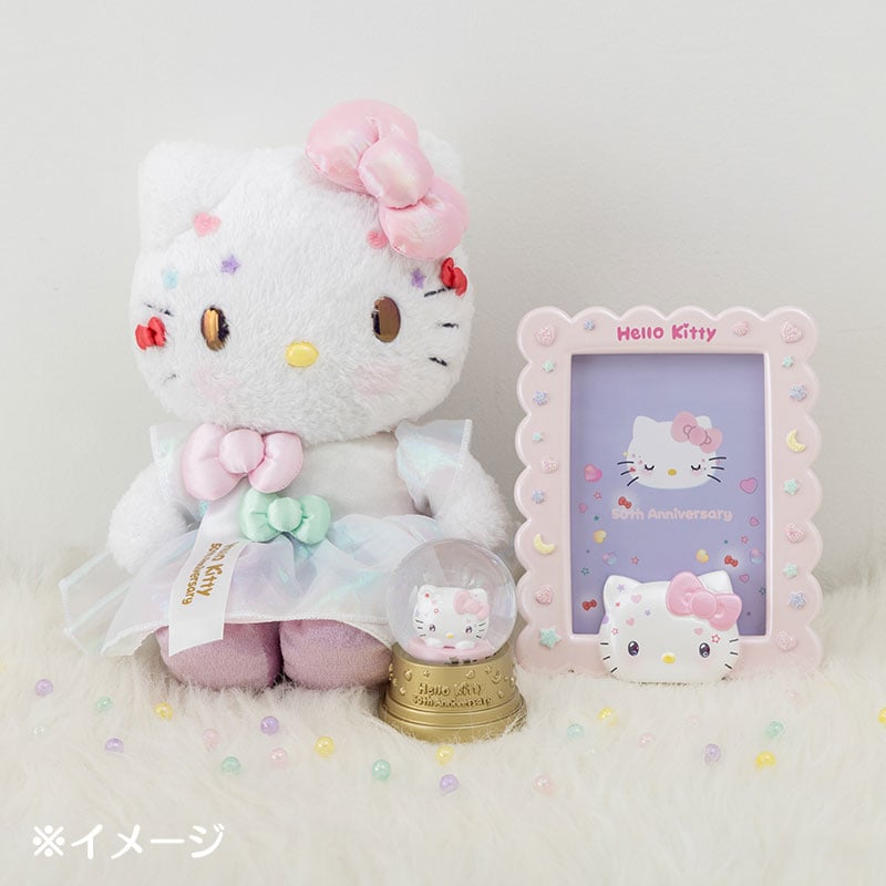 Hello Kitty snow globe being shaken, with snowflakes swirling around the character