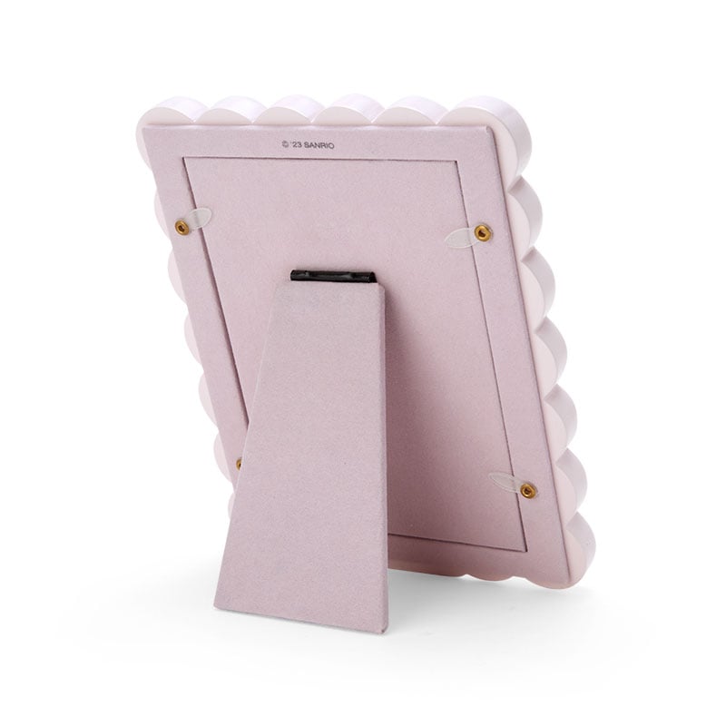Photo frame styled with Kate Spade Hello Kitty collection accessories