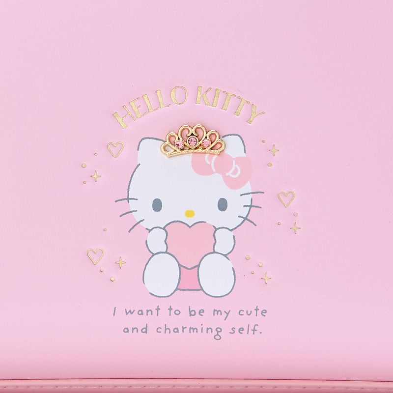 Close-up of the zipper closure and printed lining of the Hello Kitty pouch