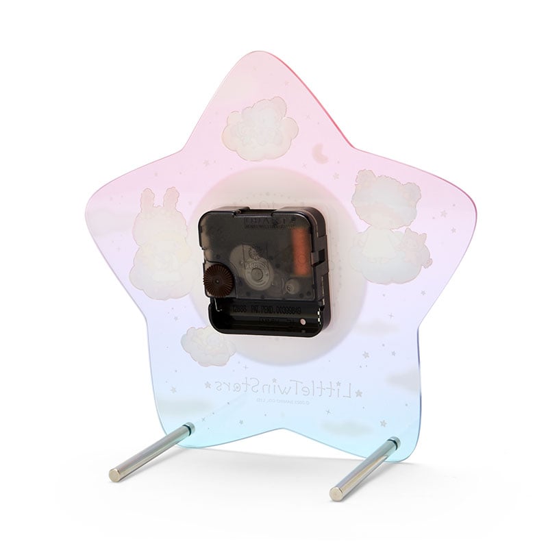Desk setup with the cute desk clock placed among other LittleTwinStars merchandise