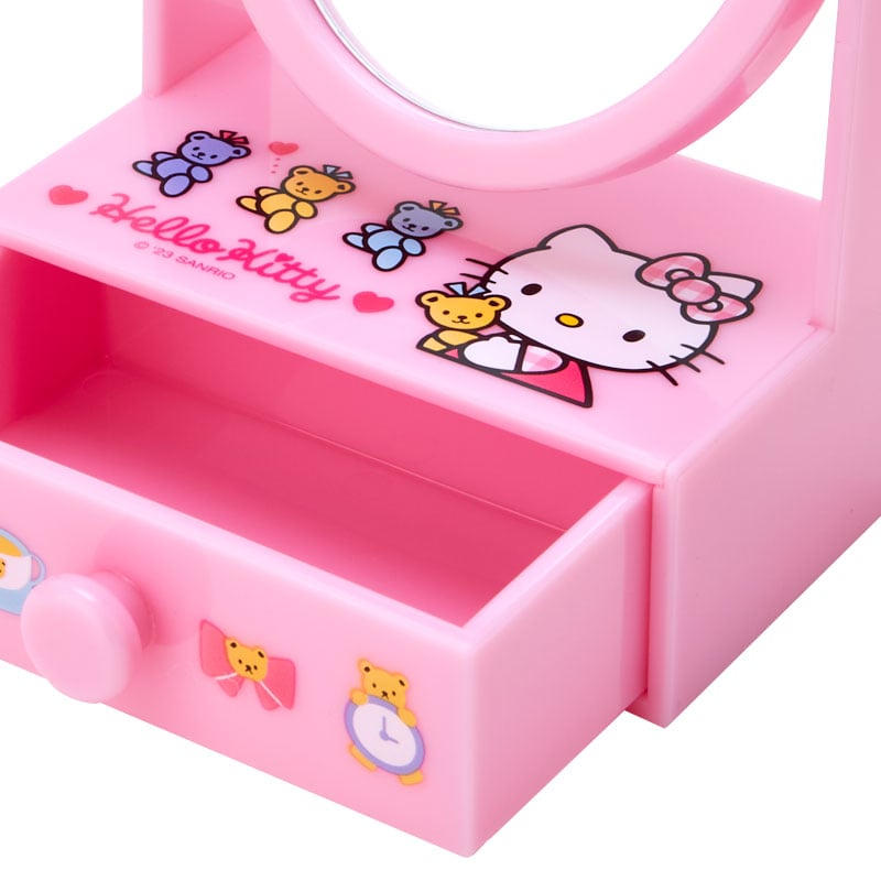 Close-up of Hello Kitty cosmetic organizer case with open drawer