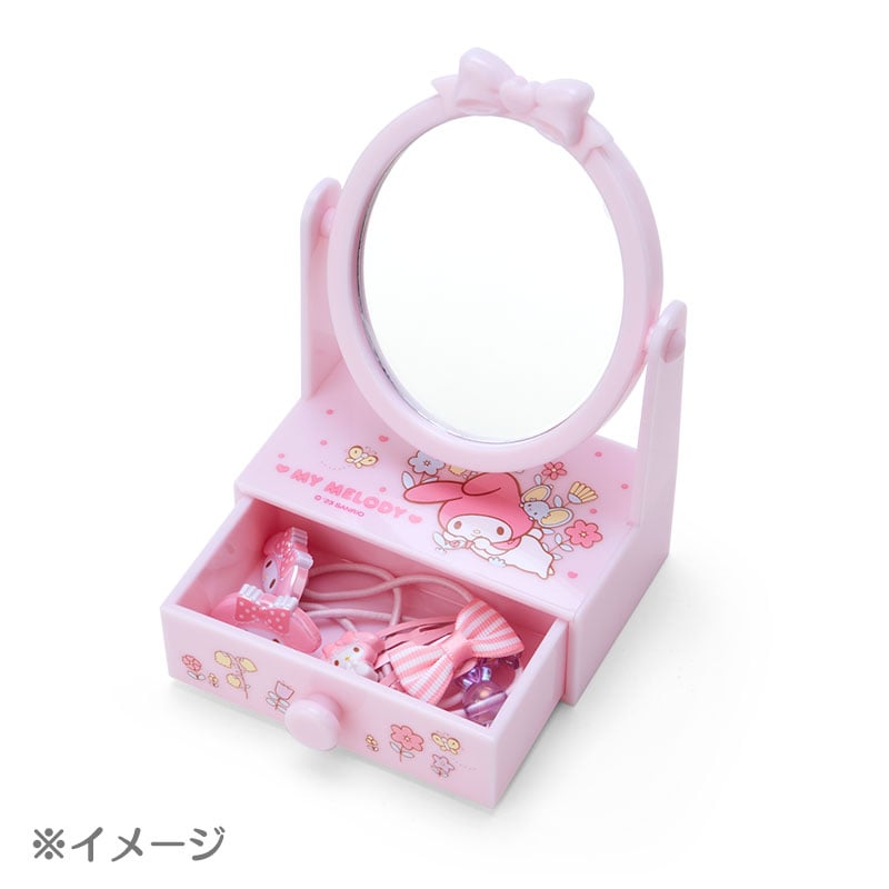 Close-up of Hello Kitty cosmetic organizer case with open drawer