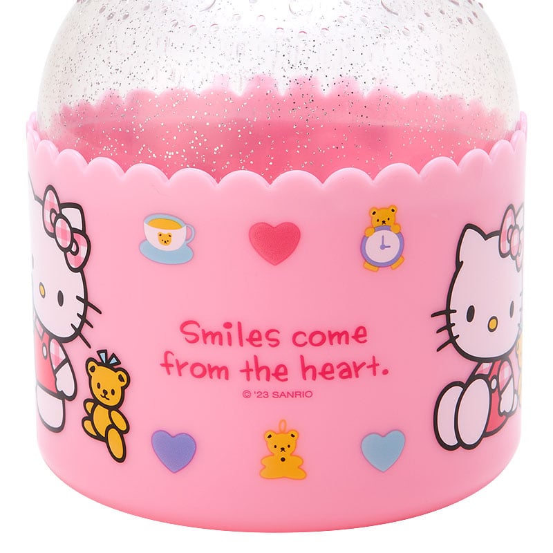 Kawaii Hello Kitty storage box placed on a vanity, organizing cotton puffs.
