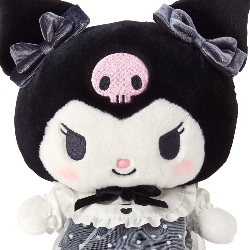 Pretty Party Kuromi plush backpack next to the plush doll.