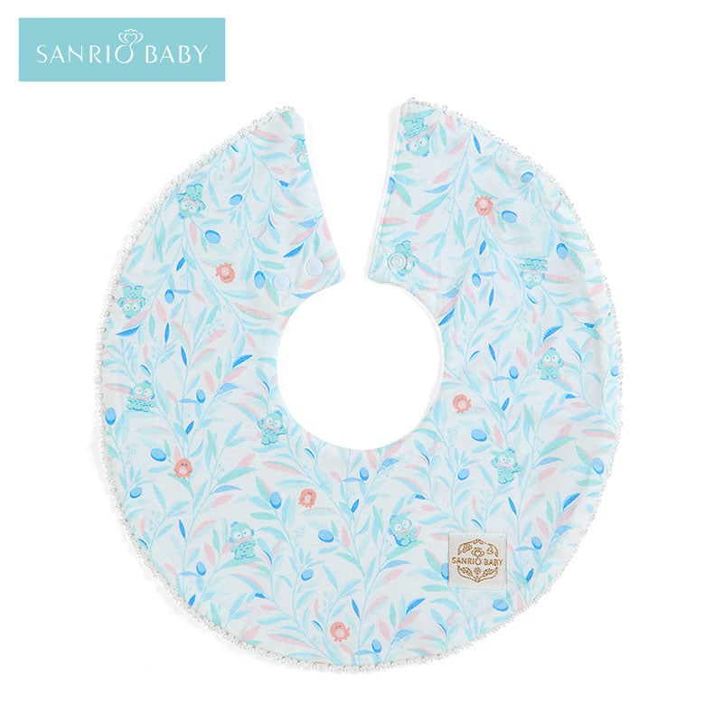 Flat lay of Hangyodon organic cotton baby bib showing lace accents and floral pattern