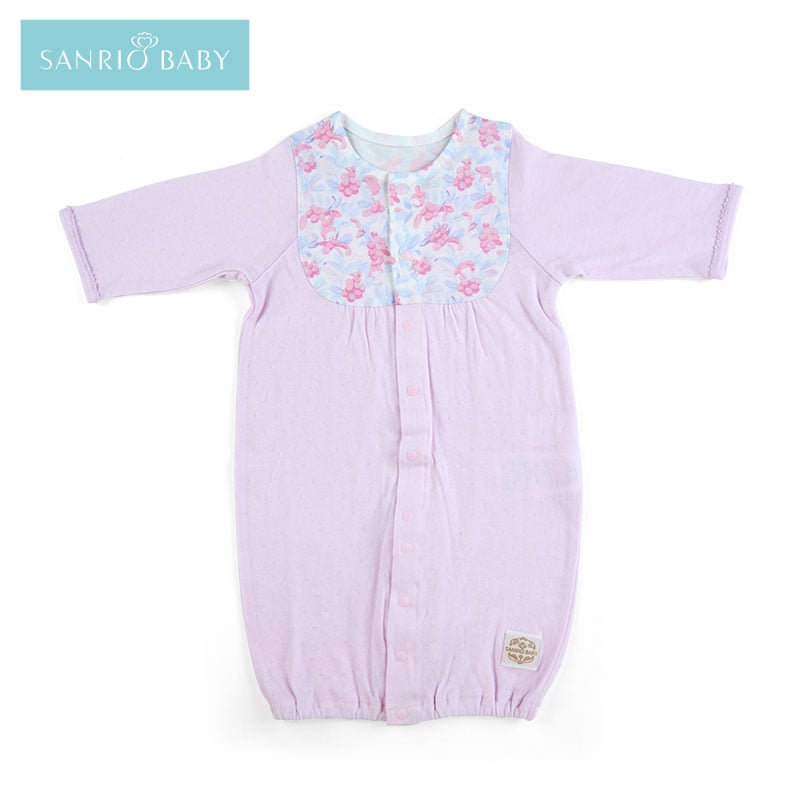 Front view of Sanrio Baby organic cotton gown featuring floral print and snap closures